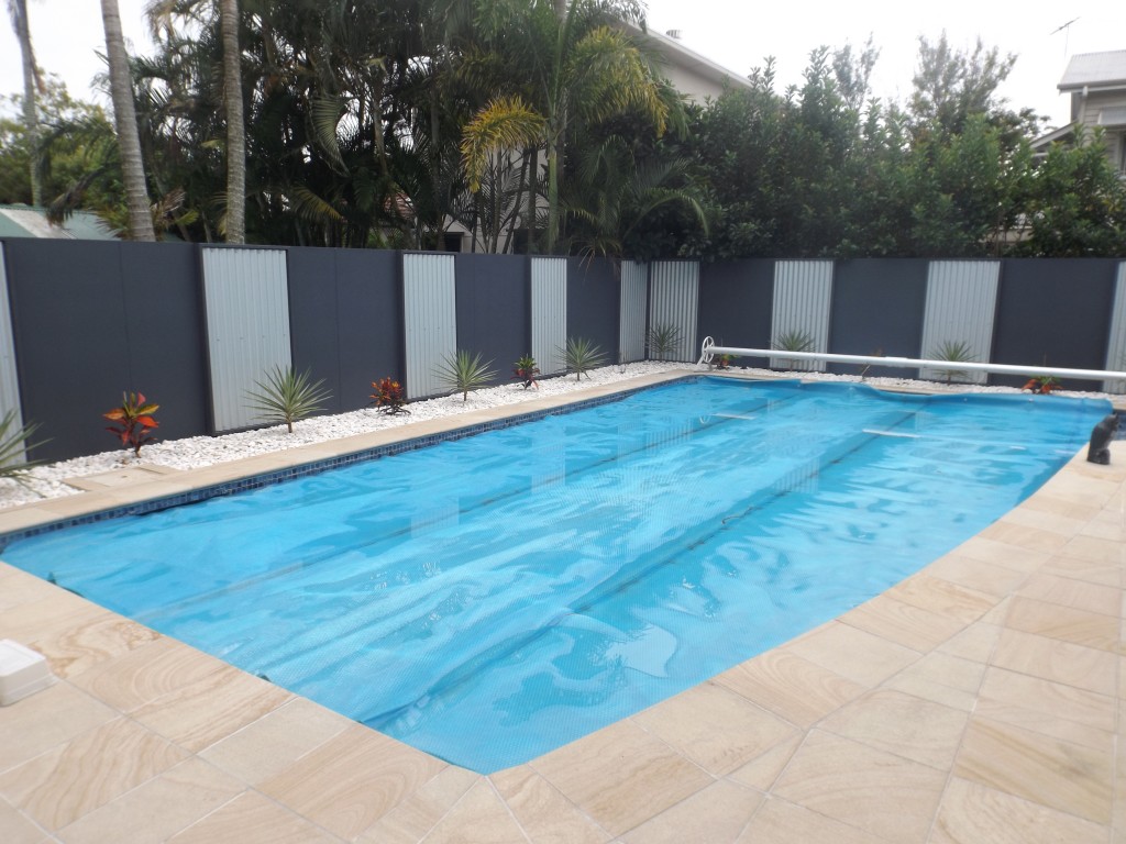 inground pool with concrete surround