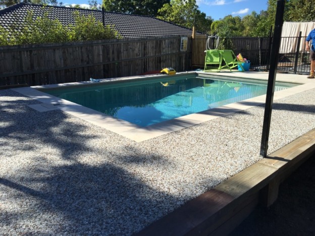 inground pool with concrete surround